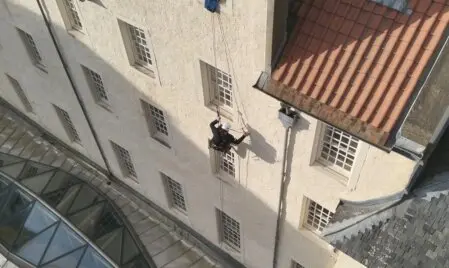 Rope access team carrying out an inspection on an industrial structure